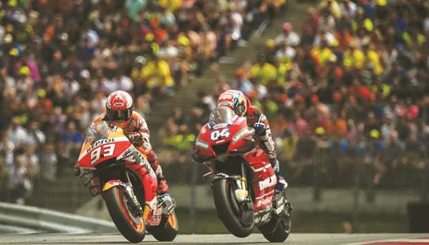 Mission Winnow Ducatiu2019s Italian rider Andrea Dovizioso (right) beats Repsol Hondau2019s Spanish rider Marc Marquez for the Austrian MotoGP victory in Spielberg yesterday. (AFP)