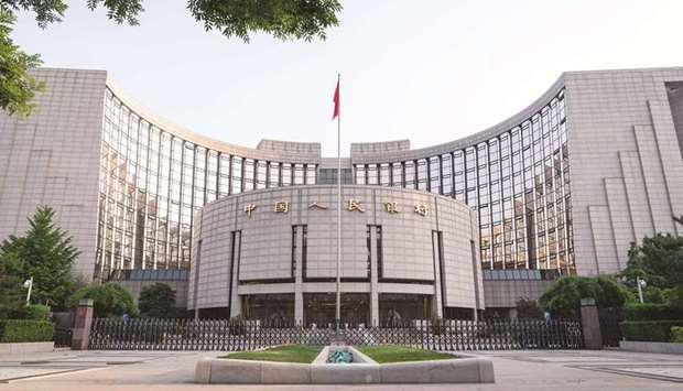 The Peopleu2019s Bank of China headquarters building in Beijing. Chinau2019s central bank fanned expectations of further monetary policy easing, saying in its latest quarterly report that inflation pressures are u201ccontrollable,u201d while highlighting risks to the economic growth outlook.