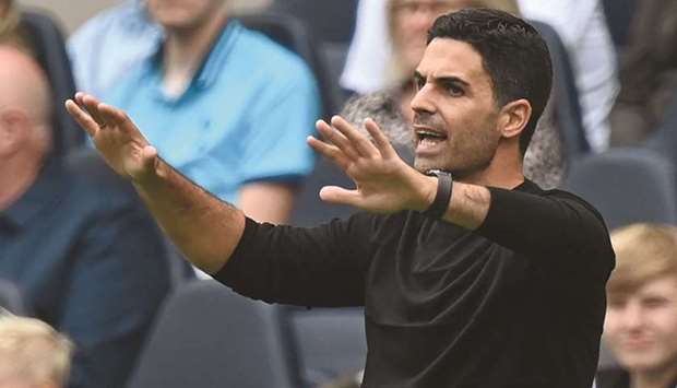 Arsenal manager Mikel Arteta gestures on the touchline during the pre-season friendly against Tottenham Hotspur on Sunday. (AFP)