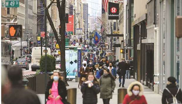 People walk on a busy 5th Avenue in New York City. US consumer sentiment fell in early August to the lowest level in nearly a decade as Americans grew more concerned about the economyu2019s prospects, inflation and the recent surge in coronavirus cases.