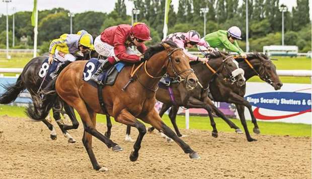 Oisin Murphy (foreground) rides Battle Of The Nile to victory in Cazoo Nursery Handicap in Wolverhampton on Tuesday. (Jonathon Hipkiss)