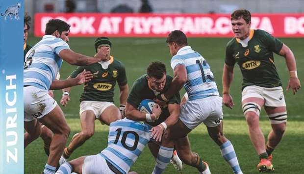 South Africau2019s fly-half Handre Pollard (centre) is tackled by Argentinau2019s fly-half Domingo Miotti during the Rugby Championship Test at The Nelson Mandela Bay Stadium in Port Elizabeth yesterday. (AFP)