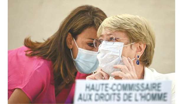 UN High Commissioner for Human Rights Michelle Bachelet (right) speaks with an assistant during a special session of the UN Human Rights Council on Afghanistan in Geneva yesterday. (AFP)