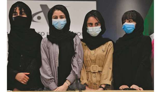 Members of the Afghanistan robotics team following their arrival to Mexico after seeking refuge at the Benito Juarez International Airport. (AFP)