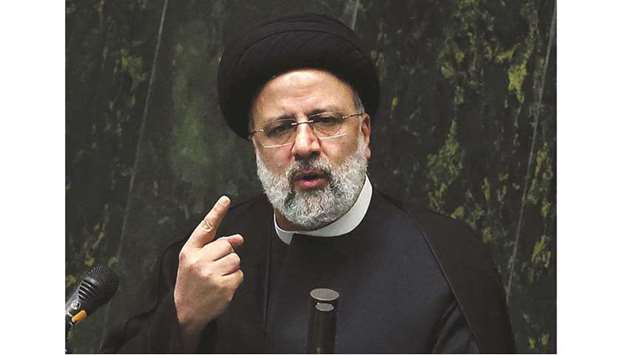 Iranu2019s President Ebrahim Raisi speaks before parliament in Tehran.