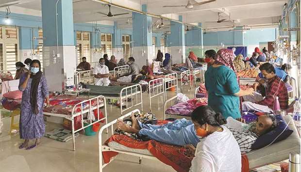 People are provided treatment at a Covid-19 ward at the Government Medical College Hospital in Manjeri, Malappuram district, Kerala.