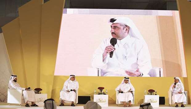 QSTP executive director Yosouf al-Salehi speaking at the fourth edition of Najah Qatari with Engineer Essa bin Hilal al-Kuwari, Kahramaa president, and Dr Saad bin Ahmad al-Muhannadi, Ashghal president.