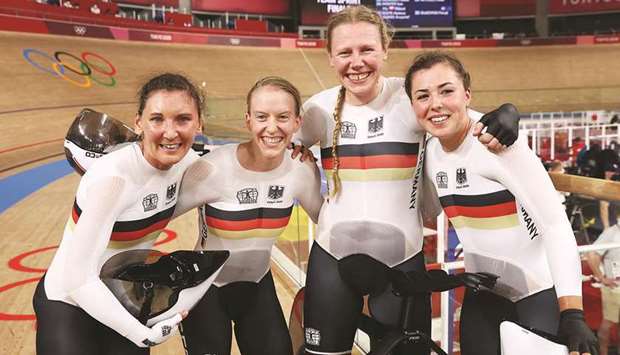 From left: Germanyu2019s Franziska Brausse, Lisa Brennauer, Lisa Klein and Mieke Kroeger celebrate after winning womenu2019s team pursuit gold in Shizuoka, Japan. (Reuters)