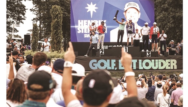 Henrik Stenson of Sweden lifts the trophy after winning in his LIV Golf series debut in Bedminster, New Jersey. (@LIVGolfInv)