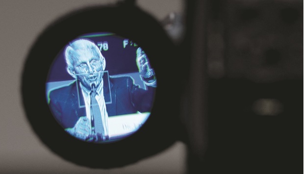 Dr Fauci is seen through a television camera viewfinder during a Senate Health, Education, Labour, and Pensions Committee hearing earlier this year.