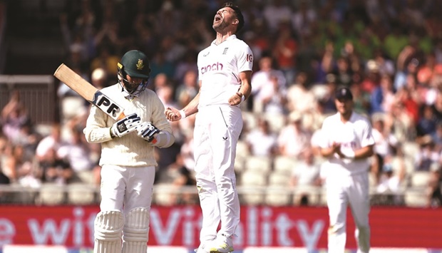 Englandu2019s James Anderson celebrates taking the wicket of South Africau2019s Keshav Maharaj on day one of the second Test at Old Trafford, Manchester, Britain, yesterday. (Reuters)