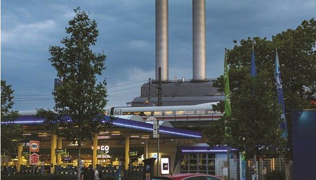 The Mitte Combined Heat and Power (CHP) natural gas power plant, operated by Vattenfall, beyond an Aral gas station in Berlin. The European Union is planning urgent action to try to dampen soaring power prices and is putting together proposals to reform the electricity market, according to Commission President Ursula von der Leyen.