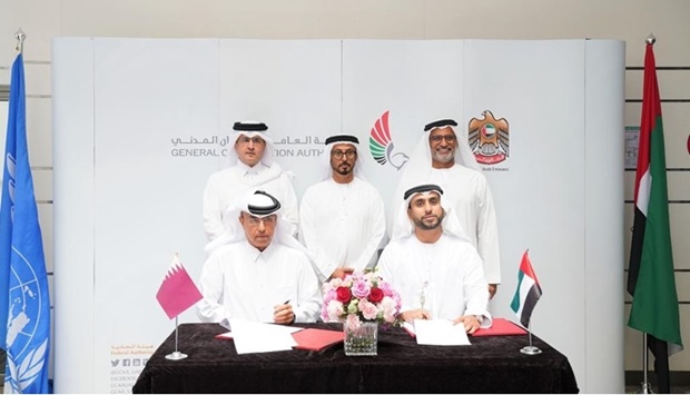 Officials at the signing of the agreements.