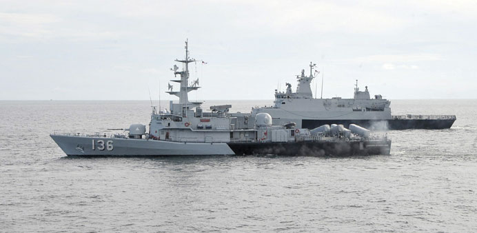 Royal Malaysian Navy KD Laksamana Muhammad Amin (front) and KD Selangor during search and rescue operations in the Straits of Malacca.