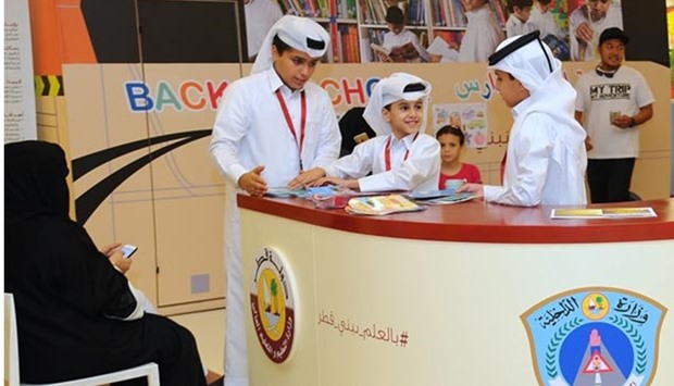 Student volunteers man the 'Back to School' booth. PICTURES: Ram Chand.