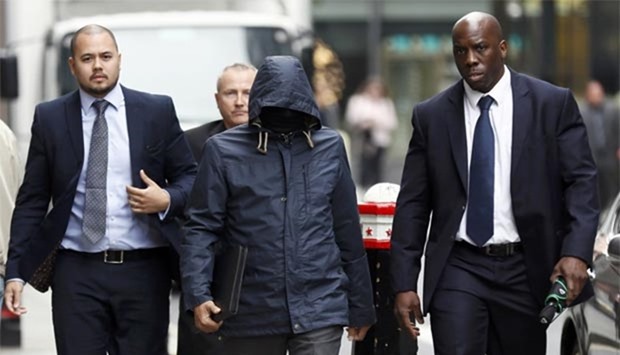 Former undercover reporter for the News of the World and the Sun on Sunday, Mazher Mahmood (centre), arrives at the Old Bailey in London this week.