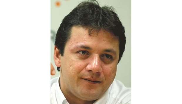 FILE PHOTO: Wesley Batista, chief executive of JBS, the worldu2019s largest beef producer, gestures as he speaks during the Reuters Latin American Investment Summit in Sao Paulo, Brazil March 25, 2011.