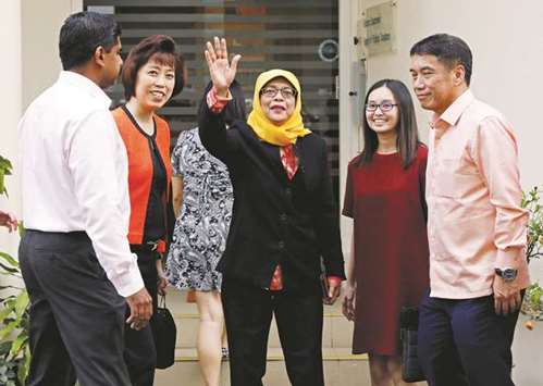 Former speaker of Singaporeu2019s parliament, Halimah Yacob, arrives at the Elections Department in Singapore.