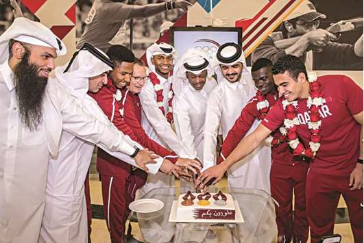 HE the QOC President Sheikh Joaan bin Hamad al-Thani, world champion high jumper Mutaz Essa Barshim, former Asian sprint champion Talal Mansour, javelin thrower Ahmed Bedeir, world 400m bronze medallist Abdulelah Haroun, hurdler Abdulrahman Samba and Qatar Athletics Federation board member Khalid al-Marri cut a cake at a ceremony yesterday to mark Qataru2019s recent success on the international stage. HE Sheikh Joaan congratulated the athletes on their performances and encouraged them to continue to excel and bring glory for Qatar.