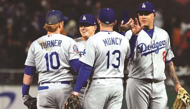 Justin Turner hits two homers as Dodgers clinch playoff berth