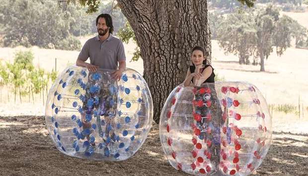 CHEMISTRY: Winona Ryder, right, and Keanu Reeves in Destination Wedding.