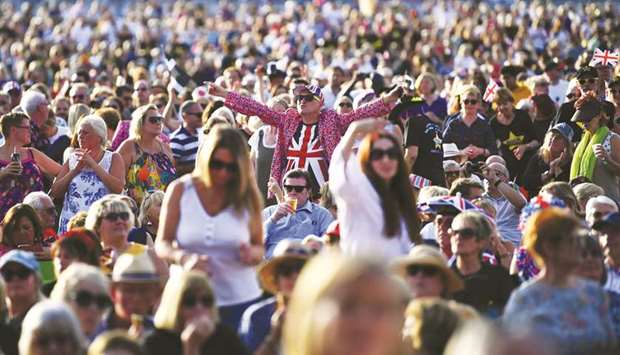 A reveller wearing a British flag T-shirt and coat is seen in the crowd during u2018The Last Night of the Promsu2019 celebration in Hyde Park, London. Remain campaigners have been accused of u201chijackingu201d the event by waving EU flags. The flag stunt was organised by an anti-Brexit campaign group but many BBC viewers condemned what they claimed was the politicising of the traditional evening.