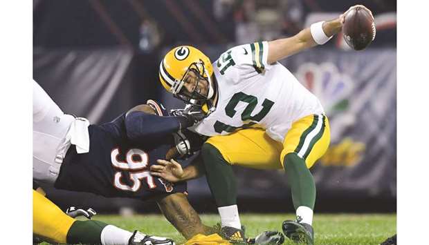 Packers' D, Aaron Rodgers beat Bears 10-3 in opener