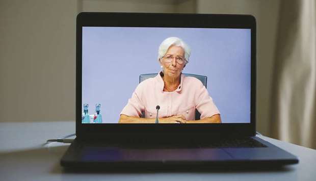 A laptop displays ECB president Christine Lagarde during a live stream video of the central banku2019s virtual rate decision news conference in Frankfurt yesterday. While warning that a second wave of coronavirus infections represented u201cheadwindsu201d, Lagarde announced a slight upgrade in the banku2019s 2020 growth forecast on the back of a strong rebound in activity and signalled higher underlying inflation.