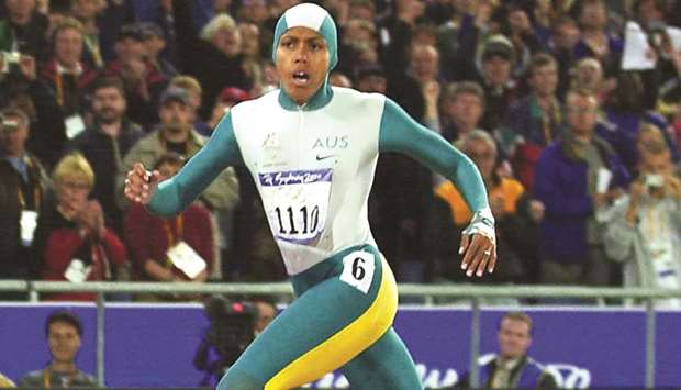 Cathy Freeman of Australia powering over the finish line in the 400m final at the Sydney Olympic Games on September 15, 2000.