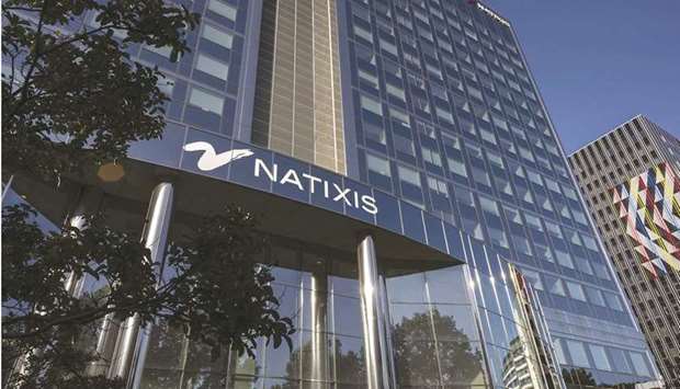 The Natixis logo sits on the companyu2019s offices in Paris. The French investment bank is beginning a fresh push into the complex derivatives that blew up twice in recent years, causing hundreds of millions of euros in losses and helping end the tenure of the lenderu2019s former chief executive officer.