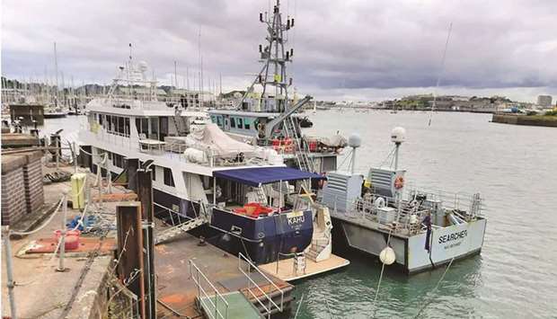 This handout photograph released by the UK National Crime Agency shows the luxury yacht Kahu, moored on the southern English coast.