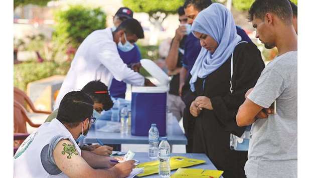 Palestinians register to receive a dose of the Sputnik-V vaccine against the coronavirus, during a vaccination campaign organised by the health ministry, in Gaza City, yesterday.