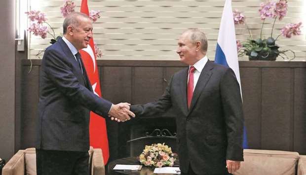 Russian President Vladimir Putin welcomes his Turkish counterpart Recep Tayyip Erdogan in Sochi . (AFP)