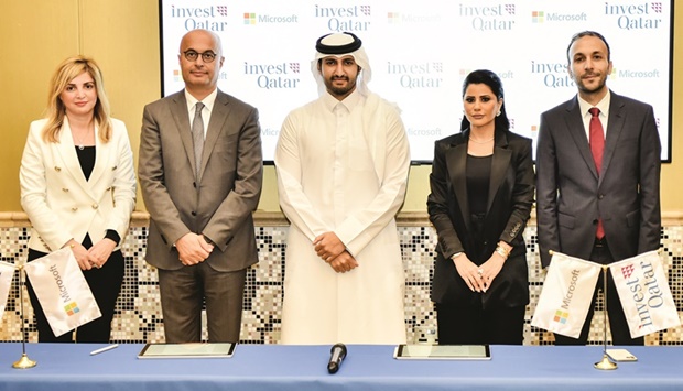 IPA Qatar and Microsoft officials during the MoU signing.