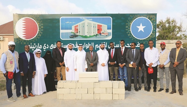 Officials and dignitaries pose for a group photo.