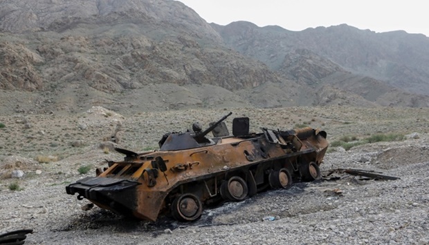 A view shows a burnt armoured personnel carrier of Kyrgyz forces near Golovnoi water distribution facility outside the village of Kok-Tash in Batken province, Kyrgyzstan May 5, 2021. REUTERS