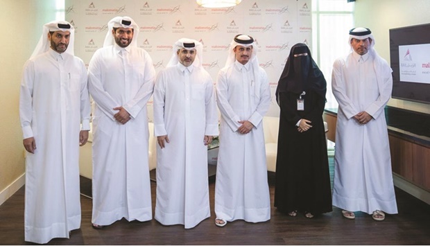 Dr Abdulla bin Abdulaziz bin Turki al-Subaie with a number of representatives from Qatar Rail and Malomatia during the visit at the new Cyber Security Operation Centre.