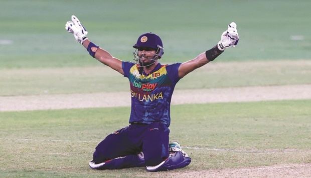 Sri Lankau2019s captain Dasun Shanaka celebrates their win in the Asia Cup Twenty20 international Super Four match against India at the Dubai International Cricket Stadium in Dubai yesterday. (AFP)