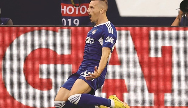 Dinamo Zagrebu2019s Mislav Orsic celebrates after scoring a goal during the Champions League match against Chelsea in Zagreb yesterday. (AFP)