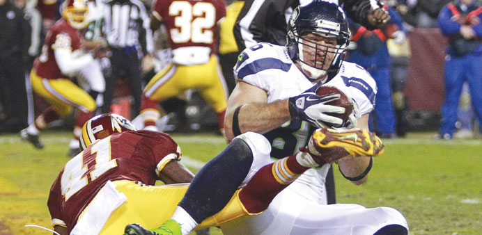 Seahawks rally to 24-14 win over Redskins, RGIII injures knee late