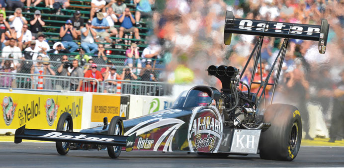 Reigning World Champion Shawn Langdon makes his Friday afternoon qualifying run at the 27th annual Ou2019Reilly Auto Parts NHRA Nationals in Kent, Washing