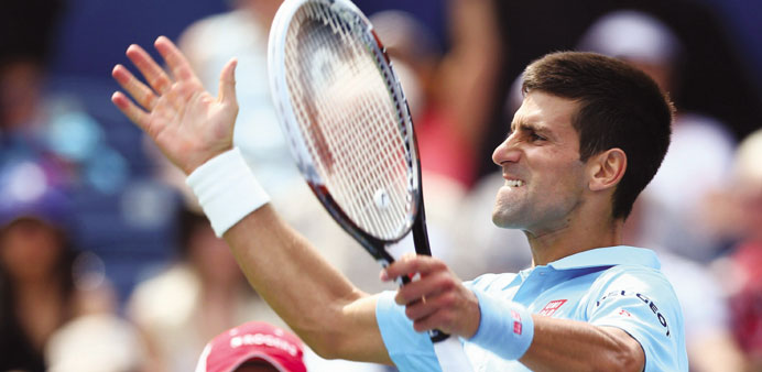 Djokovic battles past Murray