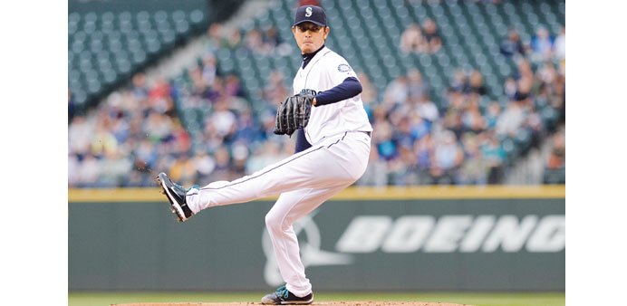 Starting pitcher Hisashi Iwakuma of the Seattle Mariners pitches