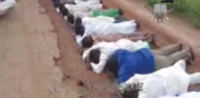 A screengrab taken yesterday from a video allegedly shows people lined up before being executed at an undisclosed location.