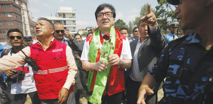 Jackie Chan takes part in relief work - Gulf Times