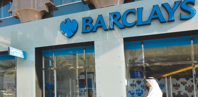 A pedestrian walks past a branch of Barclays bank in Dubai (file). The Middle East and Africa generated about u00a34.5bn of revenue for Barclays last year