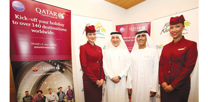 Akbar al-Baker with Sheikh Salem bin Sultan bin Saqr al-Qasimi at the Arabian Travel Market in Dubai.