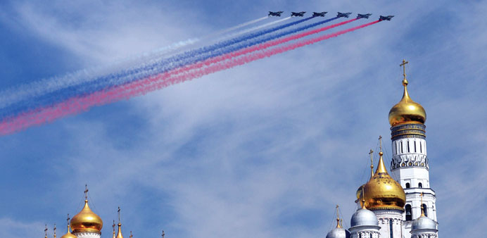 Russian Sukhoi Su-25 Frogfoot ground-attack planes fly over Red Square during the Victory Day military parade in Moscow on May 9. Russian President Vl