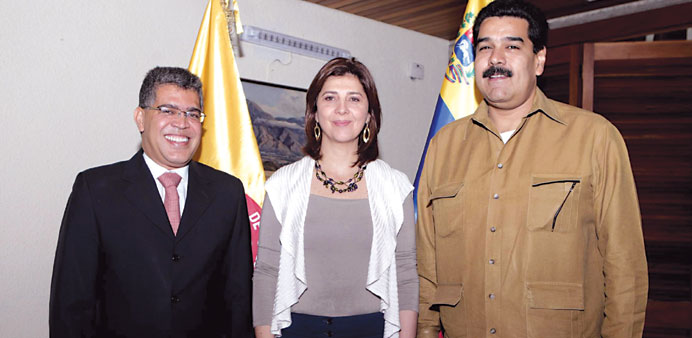 Left to right: Venezuelau2019s new Foreign Minister Elias Jaua, his Colombian counterpart Maria Angela Holguin and Venezuelau2019s Vice President Nicolas Madu