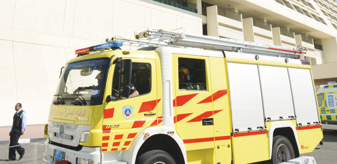 A Civil Defence vehicle in action in front of Sheraton Doha yesterday during the mock drill.